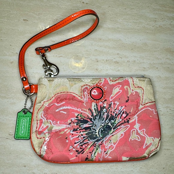 Coach Handbags - Gently Used Coach Fabric Floral Sequins Wristlet